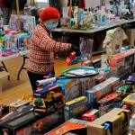 Matthew Nash/Sequim Gazette file photo
Volunteer Pat Gritman sorts toys at last years Toys for Sequim Kids event. The annual event returns Dec. 14 to the Sequim Prairie Grange with donations accepted throughout the area through Dec. 12.
