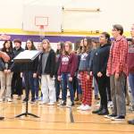 Sequim Gazette photo by Michael Dashiell / The Sequim high School choir presents the National Anthem at a Veterans Day ceremony at Olympic Peninsula Academy and Dungeness Virtual School on Nov. 9.