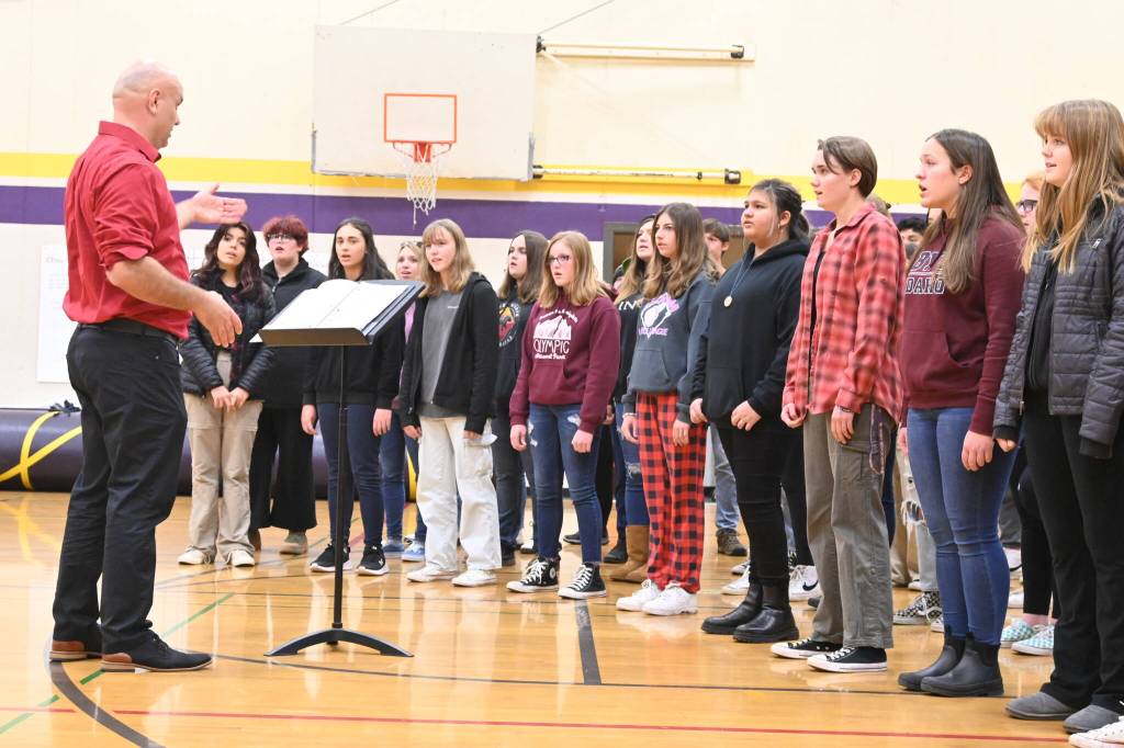 Sequim Gazette photo by Michael Dashiell / The Sequim high School choir presents the National Anthem at a Veterans Day ceremony at Olympic Peninsula Academy and Dungeness Virtual School on Nov. 9.
