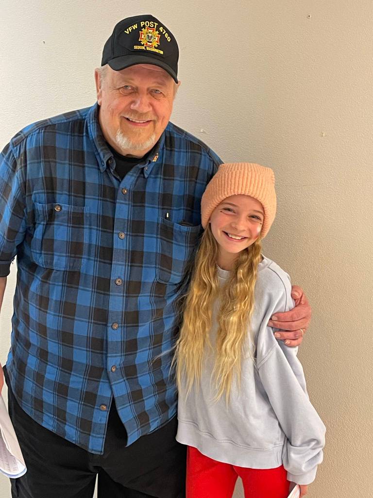 Photo courtesy of Greywolf Elementary School / Emmelia Henrikson celebrates her grandfather Steve at Greywolf Elementary Schools annual Veterans Day ceremony, held at the school on Nov. 10.