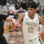 Photo by Keith Thorpe/Olympic Peninsula News Group / Peninsulas Roosevelt Williams Jr., right, a Perth, Australia native, averaged 9.4 points and 3 assists last year as a starter.
