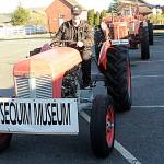 Sequim Gazette photo by Matthew Nash
Bob Stipe, volunteer and Dungeness Schoolhouse manager, sits atop a 1953 TO-30 Ferguson donated by Ferd Schnuriger that will be in the Nov. 26 Tractor Cruise that goes through Sequim starting at 5 p.m.