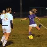 Sequims Taryn Johnson, right, looks for an open teammate as the Wolves take on Kingston at home on Oct. 27. Sequim won the Olympic league match-up, 4-0.
