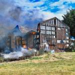 Photo by Jay Cline/Fire District 2 A shop is a total loss and a garage damaged in a June 30 fire in the Agnew area on June 30. A nearby residence was undamaged and no one was hurt in the incident, Fire District 3 officials said.