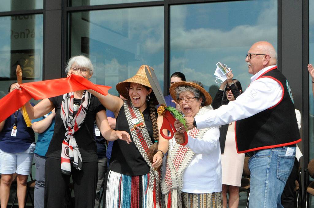 Sequim Gazette photo by Matthew Nash/ To usher in the Jamestown SKlallam Tribes Healing Clinic on Aug. 20, from left, Dana Ward, tribal council member; Loni Greninger, council vice-chair; Elaine Grinnell, elder, and W. Ron Allen, chairman, cut the ribbon on the facility that aims to help locals overcome opioid use disorder.