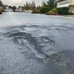 Sequim Gazette PHOTO BY Matthew Nash/
A car fire in Jennies Meadow burned so hot that its tires popped and burned into the asphalt, witnesses said.