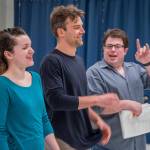 Sequim Gazette photo by Emily Matthiessen / Performers Sarah Kauffman (Rhoda) and Noah Long (Phil Davis) laugh with director Mark Lorentzen during a rehearsal for Ghostlight Productions upcoming White Christmas.