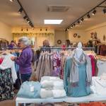 At the grand opening of Be Blossom Boutique on Nov. 30, Sequim-Dungeness Valley Chamber of Commerce members and other celebrants shop for womens clothing and jewelry.