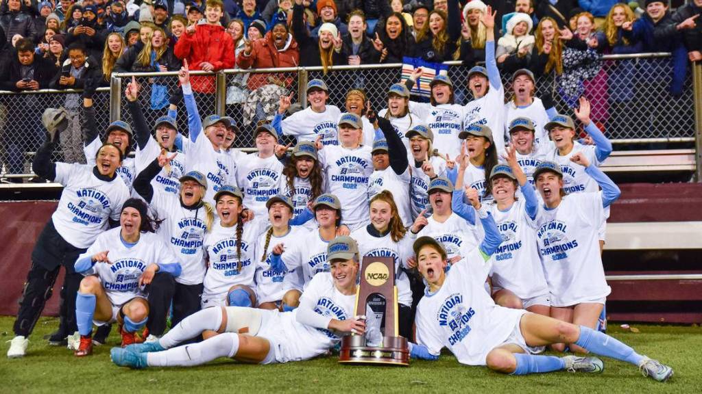Photo by Michael Potash/WWU / Sequims Claire Henninger (front row, left) and the Western Washington University womens soccer team celebrates an NCAA Division II title in Seattle on Dec. 3.