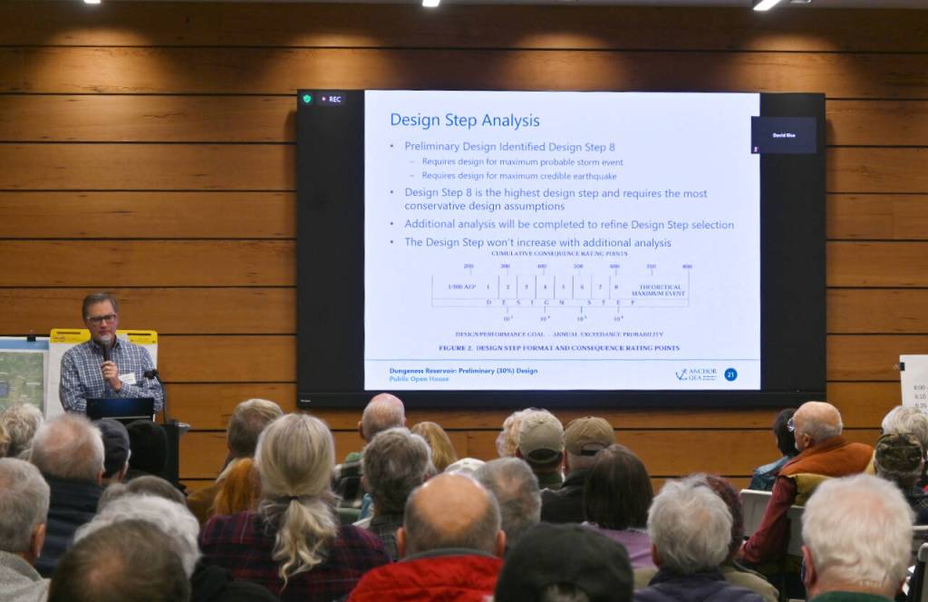 Bob Montgomery, a principal water resources engineer with Anchor QEA  the lead engineering company for the Dungeness Off-Channel Reservoir project  talks about dam safety at an open house at the Dungeness River Nature Center on Dec. 6. The project is being designed at a Step 8 level, requiring the most conservative design assumptions and designed for the maximum credible earthquake, Montgomery noted.