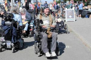 KEITH THORPE/PENINSULA DAILY NEWS
Ian Mackay of Agnew, center, prepares to lead a group of wheelchair, bicyclists, runners and others on a portion of Sea-to-Sound, a three-day, 74-mile multi-modal group ride along a section of the Waterfront Trail in Port Angeles on Saturday. The excursion, which followed numerous portions of the Olympic Discovery from west of Lake Crescent to the Larry Scott Trail in Jefferson County, was orgainzed through Ian' Ride, a non-profit organization with the goal of getting people outdoors to enjoy the sights and sounds of nature.