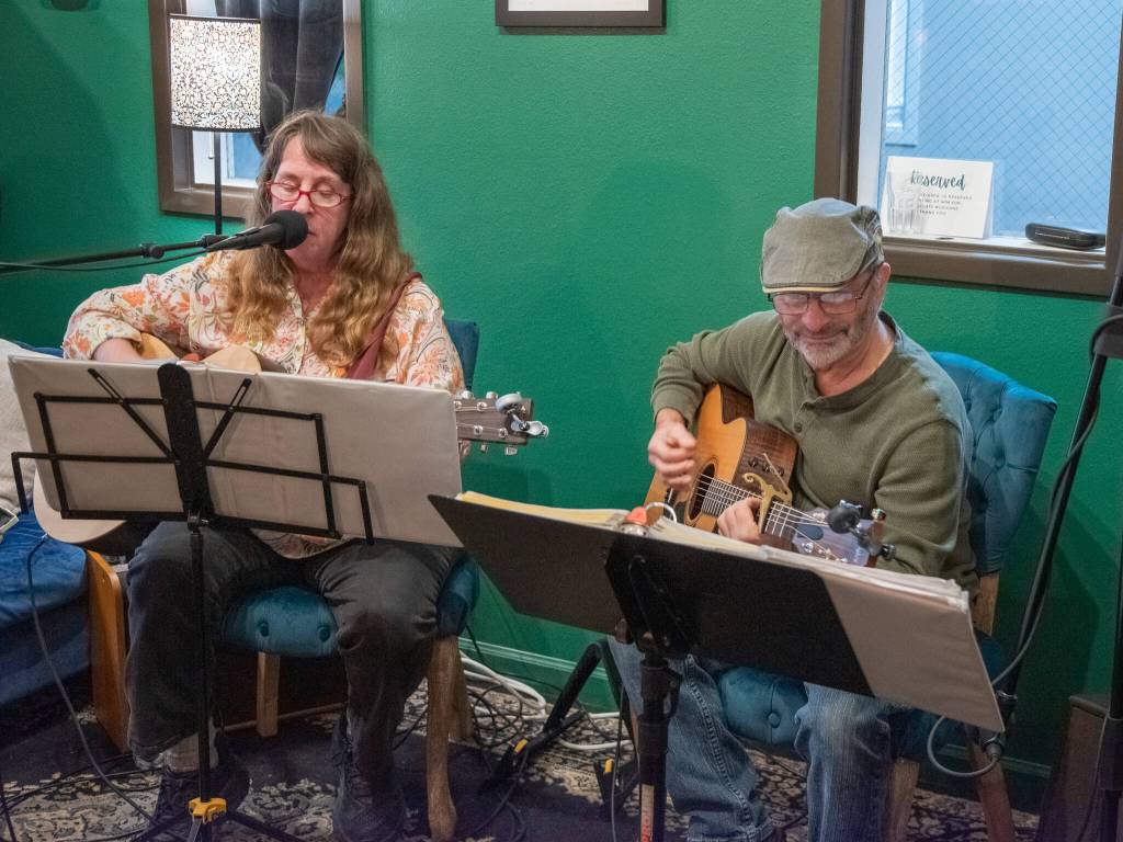 Sequim Gazette photo by Emily Matthiessen / Sequim duo Nightbird (Shirley Mercer, left, and Kim Hammon) play a variety of covers at Wild Goddess Brews-n-Bites last Friday evening. The owners are excellent to work with, said Mercer. Other musicians should give it a try.