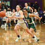 Sequim Gazette file photo by Michael Dashiell / Sequim guard Hannah Bates, left, takes a steal and looks for a basket as Port Angeles Jenna McGoff gives chase in the Wolves 60-55 win over Port Angeles in January.