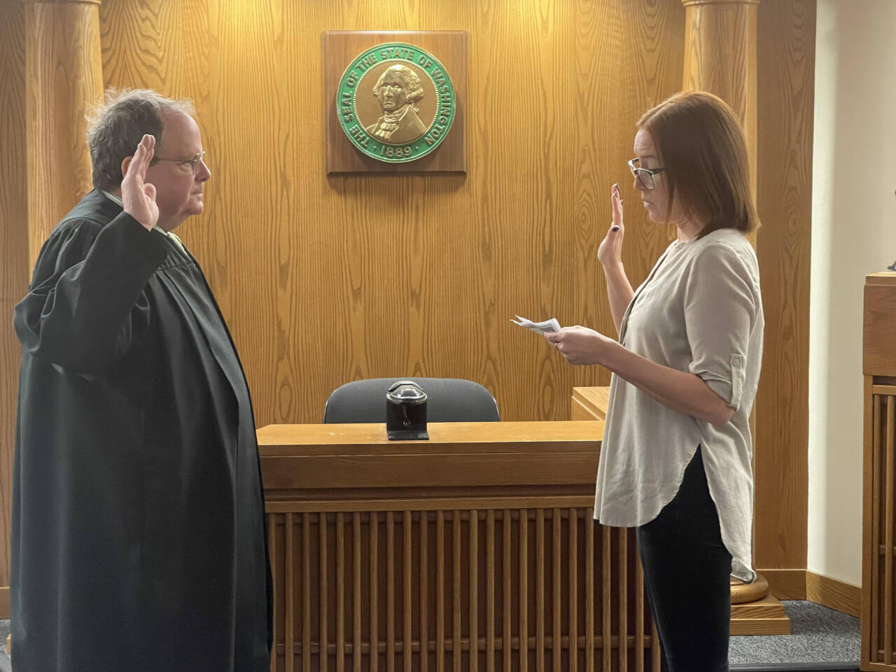 Photo courtesy of Dave Neupert / Dave Neupert is administered the oath of office as Judge of Clallam County District Court I by court clerk Stacey Romero Dec. 28. Neupert was recently elected to his second term of office and will through December 2026. District Court I serves the eastern portion of Clallam County from Lake Crescent to the Jefferson county line. Neupert presides over misdemeanor and gross misdemeanor criminal cases as well as traffic matters, small claims actions, anti-harassment protection orders and other civil litigation cases.
