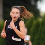 Sequim Gazette file photo by Michael Dashiell
Sequim High junior Kaitlyn Bloomenrader races to a sixth place finish at the Olympic League cross country championships at The Cedars at Dungeness golf course on Oct. 20. Bloomenrader was selected for the Peninsula Daily News All-Peninsula Cross Country Team.
