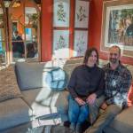 Sequim Gazette photo by Emily Matthiessen / Sequim Gazette photo by Emily Matthiessen / Jeri and Fran Sanford are reflected in some of Over the Fences many mirrors behind the couch where their daughter Emily Underwood and son-in-law Scott Underwood sit, happy new owners of the iconic Sequim store.