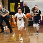 Sequim Gazette photo by Michael Dashiell / Sequim guard Bobbi Mixon, left, races downcourt for a score in the fourth quarter of a 38-31 SHS win over visiting Bainbridge. Chasing Mixon are Spartans Bella Ramirez (24) and Bella Ramirez.