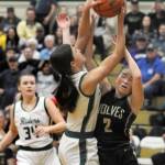Photos by Keith Thorpe/Olympic Peninsula News Group 
Port Angeles Lindsay Smith, center, and Sequims Hannah Bates fight for a rebound as Port Angeles Lexie Smith looks on at left in a Jan. 10 Olympic League game in Port Angeles. Sequim won, 40-36.