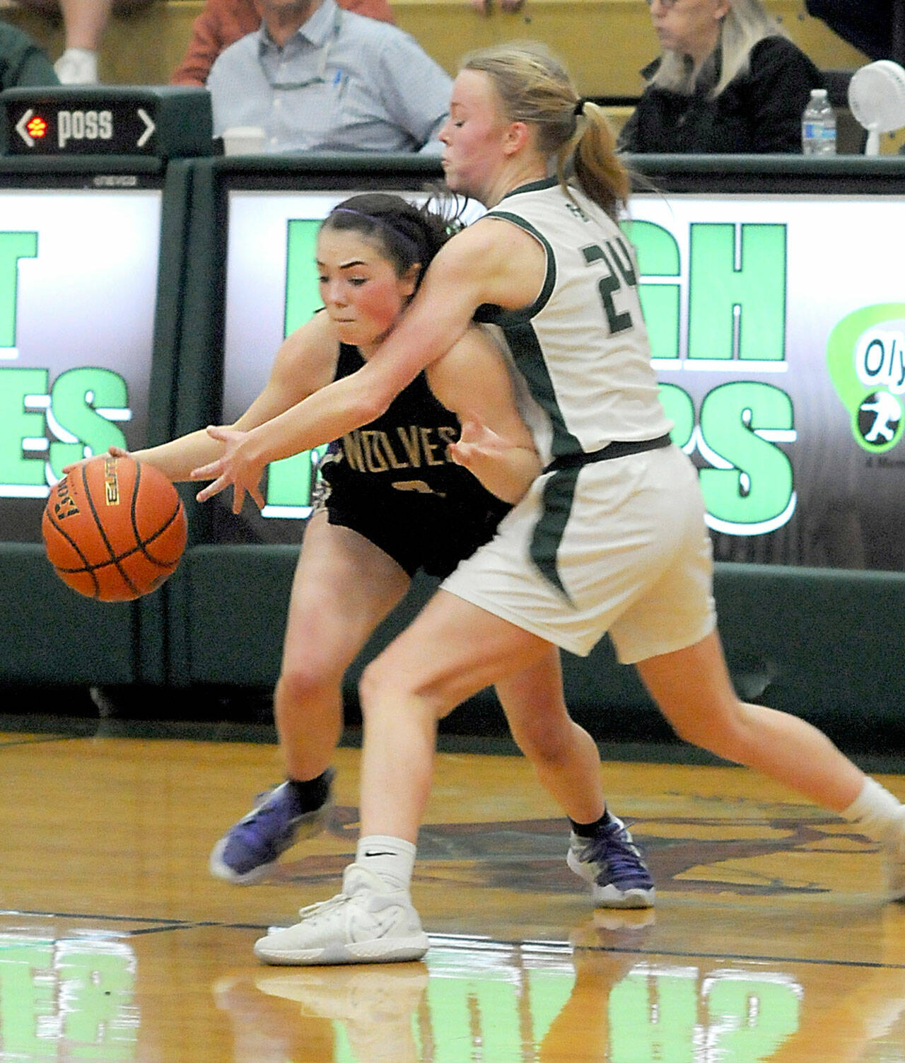 Photo by Keith Thorpe/Olympic Peninsula News Group
Sequims Hannah Bates gets cut off by Port Angeles Anna Petty during a Jan. 10 Olympic League matchup in Port Angeles.