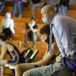 Sequim Gazette file photo by Michael Dashiell
Sequim High coach Chad Cate watches a key match during an Olympic League dual meet in June 2021.