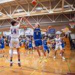 Sequim Gazette photo by Emily Matthiessen
Sequims Vince Carrizosa, left, launches a 3-pointer over Bremertons Giovanni Lowe in the Wolves 60-49 win over the visiting Knights on Jan. 17. Carrizosa led Sequim with 14 points, sinking three 3-pointers in the third quarter.