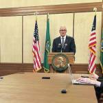 Photo by Alexandria Osborne/WNPA News Service / Gov. Jay Inslee tells reporters he will push for a bigger investment in programs for the homeless in this session of the Legislature.