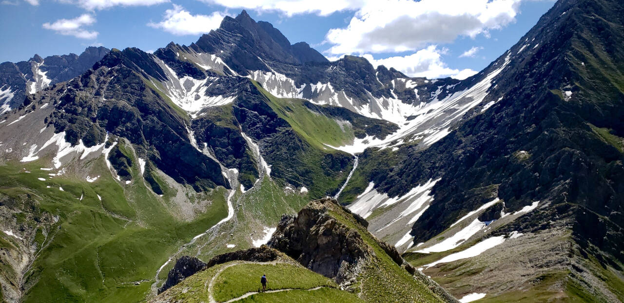 Photo by Kevin Froese/Heidi Kanning / The views inspire awe as Kevin Froese and Heidi Kanning descend from Mont de la Saxe to Col Sapin.