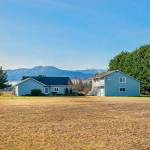 Photo courtesy Cindy Marie Photography/ This home on the 100 block of Woodcock Road listed by JACE Real Estate Company features a mountain view, and a detached shop with a full apartment. Eileen Schmitz, JACE president, said the home has drawn a lot of interest from outside the area, which is a confidence builder as it shows people are still drawn to Sequim even as the real estate market adjusts.