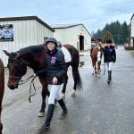 Katelynn Sharpe and Celbie Karjalainen prepare for the dressage competition at the first district meet of the season in Elma in late January.