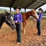 Submitted photo / Katelynn Sharpe, left, and Celbie Karjalainen compete in the showmanship event at the first district meet in Elma in late January.