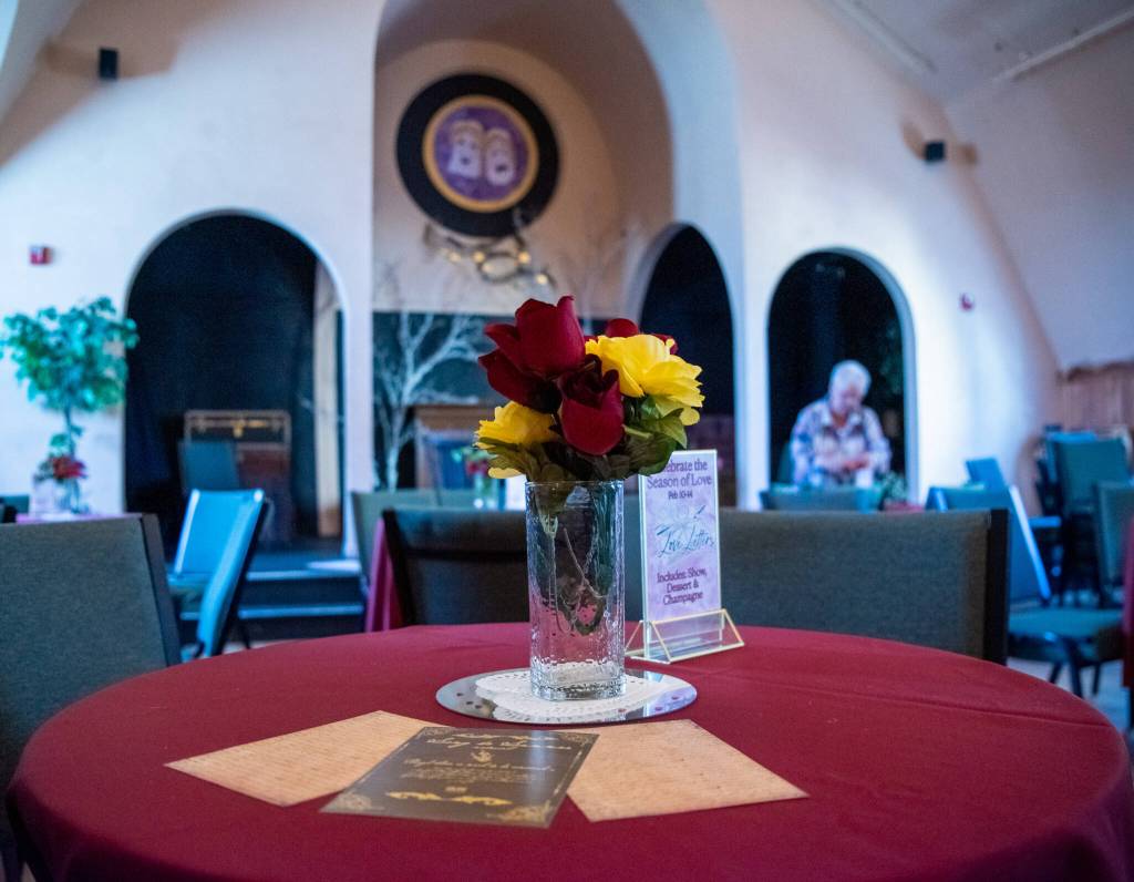 Sequim Gazette photo by Emily Matthiessen / Olympic Theatre Arts volunteers worked hard last week to turn the gathering hall into a romantic destination for the upcoming "Love Letters" reader's theater production, which includes champagne and dessert with the price of admission.