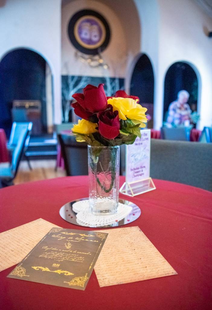 Sequim Gazette photo by Emily Matthiessen / Olympic Theatre Arts volunteers worked hard last week to turn the gathering hall into a romantic destination for the upcoming "Love Letters" reader's theater production, which includes champagne and dessert with the price of admission.