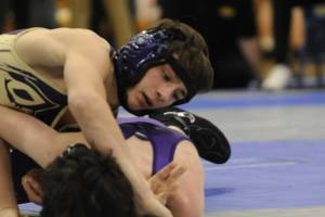 Sequim Gazette photo by Michael Dashiell
SHS junior Cayden Beauregard wrestles with Nolan Hancock of North Kitsap in a sub-regional match at Bremerton High School on Feb. 4. Beauregard placed third at a regional tournament in Belfair on Feb. 11 and looks for a strong season finish at the MatClassic tournament in Tacoma this week.