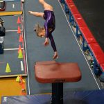 Sequim Gazette file photo by Michael Dashiell / Sequims Kori Miller competes in the vault at an Olympic League meet in Port Angeles on Jan. 11. Miller qualified for the state 2A/3A meet in both vault and bars events.