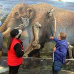 Zachary Newell, a researcher at the Center for the Study of the First Americans at Texas A&M, meets with Clare Manis Hatler in November 2020 to discuss the discovery of the Manis mastodon. Photo courtesy of Zachary Newell