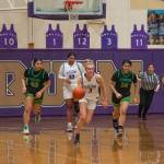 Sequims Jolene Vaara, center, pushes the ball upcourt in the Wolves 65-29 win over Clover Park in the West Central District tournament opener on Feb. 14.