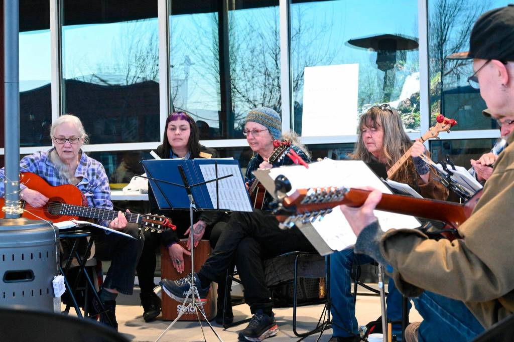 Sequim Gazette file photo by Michael Dashiell
An open jam session, seen here in March 2022, returns to Sequim Civic Centers Plaza from 5-7 p.m. on March 3.