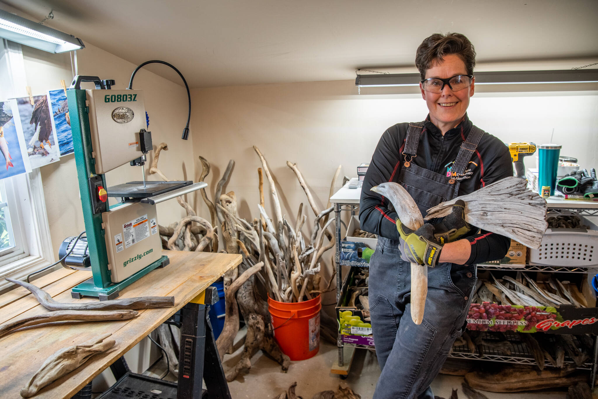 Sequim Gazette photo by Emily Matthiessen
In her workspace, local artist Molly Omann displays a wing and a head she plans to use for Fisher King, a bald eagle hunting a fish in a river.