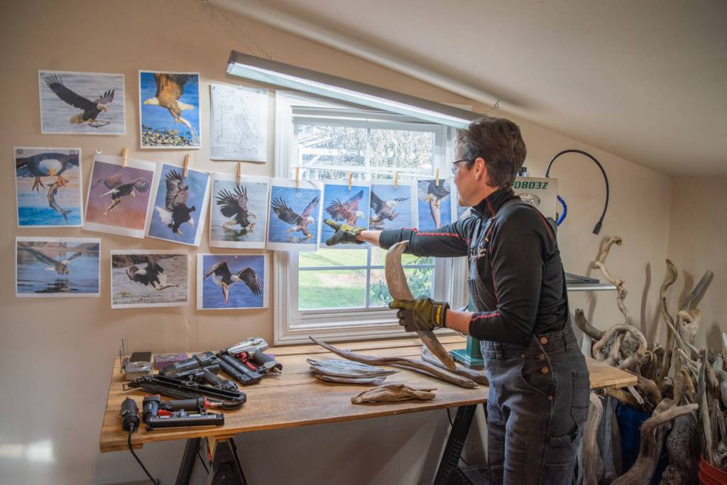 Sequim Gazette photo by Emily Matthiessen
Omann points out her models for Fisher King.