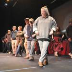 Sequim Gazette photo by Matthew Nash/ Beth McHugh as Princess Puffer, front, practices a dance number with other cast members in The Mystery of Edwin Drood at Olympic Theatre Arts running March 10-26. The musical comedy invites audience members participation to vote on the murderer, and more.