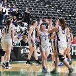Photo by Jim Heintz / Sequims Hannah Bates (2) and Hailey Wagner (32) celebrate the Wolves Round of 12 victory of Sammamish at the class 2A state tournament in Yakima on March 1.
