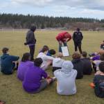 Sequim Gazette photo by Emily Matthiessen / From left, junior varsity coach Dave Breckenridge, and assistant coaches Jared King and Javier Gomez lay out a practice plan for the junior varsity soccer team.