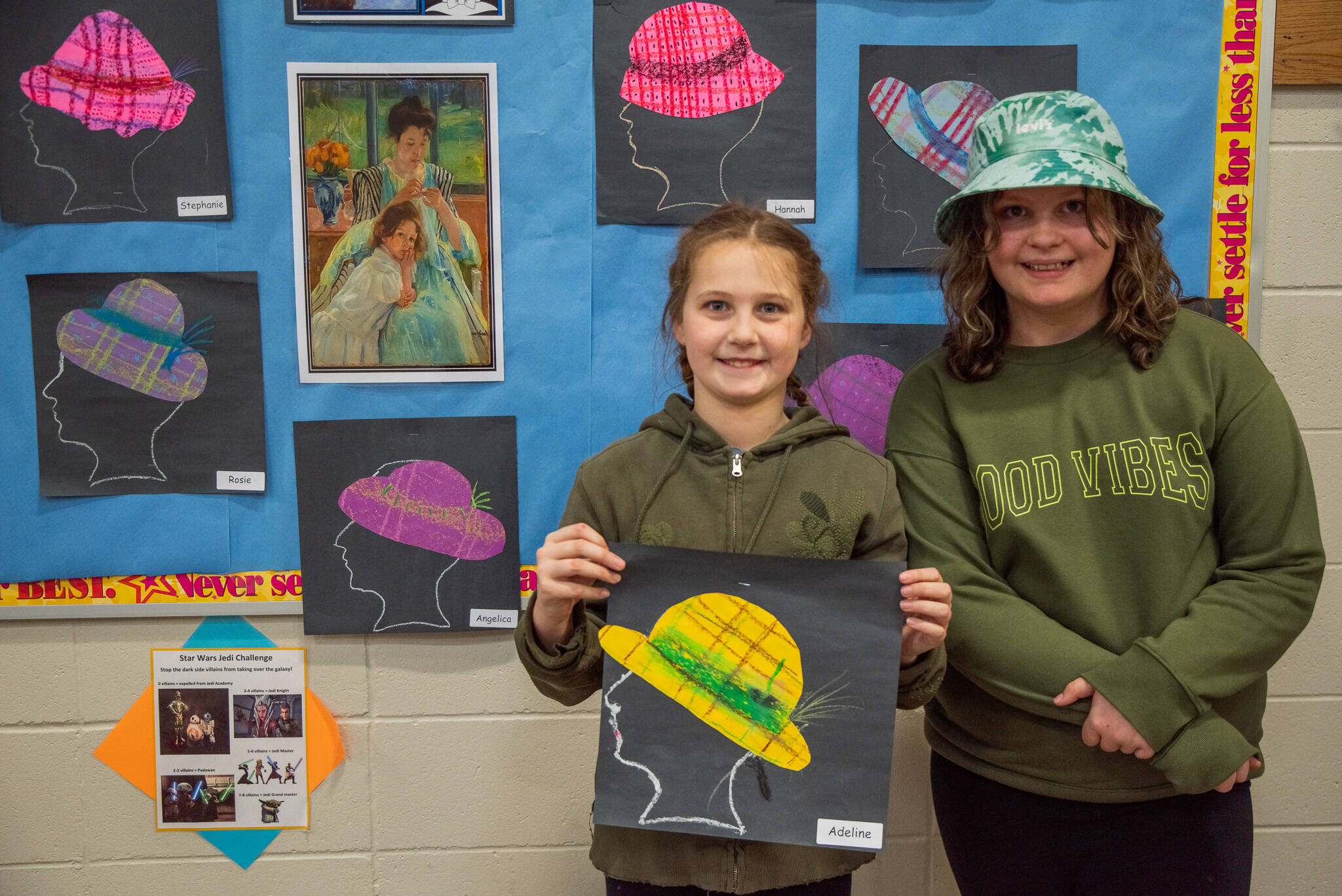 Sequim Gazette photo by Emily Matthiessen / Friends Addie Slezak, left, and Lily Sanford said they both really liked the Meet the Masters art class. Slezak holds her Mary Cassatt inspired art piece. It helped you express yourself, she said. Sanford said, It was great. It showed you want you wanted to do in art.