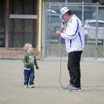 Sequim Gazette photo by Matthew Nash/ Kamden Owens, 3, greets Stephen Rosales during a ceremony renaming a field the Kayla Owens Field at the James Standard Park to honor Kamdens mom.