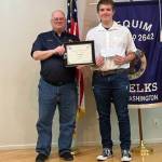 Submitted photo / Sequim High sophomore Luke Rocha accepts his Sequim Elks Lodge Student of the Month honor for February 2023 from lodge secretary Jim Headley.