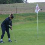 Sequim Gazette photo by Emily Matthiessen / Sequims Jelissa Julmist lines up a putt in the Wolves March 23 match-up with Bainbridge.