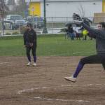 Sequim Gazette photo by Emily Matthiessen / Sequims Angel Wagner pitches through inclement weather in the Wolves 26-11 home win against Bremerton.