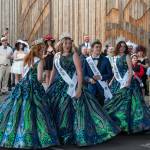 Sequim Gazette photo by Emily Matthiessen / Princess Anne Marie Barni, Princess Skylar Kryzworz, Prince Fred Cameron, and Queen Pepper Reymond react as they see their float for the first time at the kick-off dinner and auction for the Irrigation Festival at the 7 Cedars Resort on March 25.