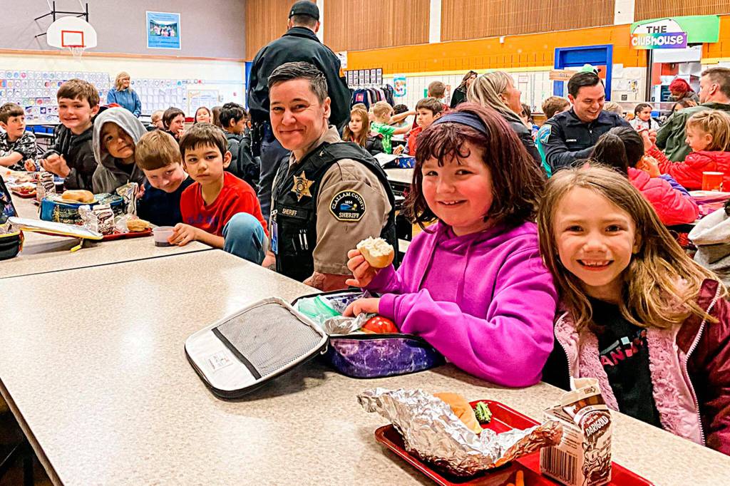 Photo courtesy Helen Haller PTO
Chief criminal deputy Amy Bundy with Clallam County Sheriffs Office meets with second graders from Mrs. Minard and Mrs. Mullikins second grade classes at a Law Enforcement Appreciation Lunch on March 27 in Helen Haller Elementary.