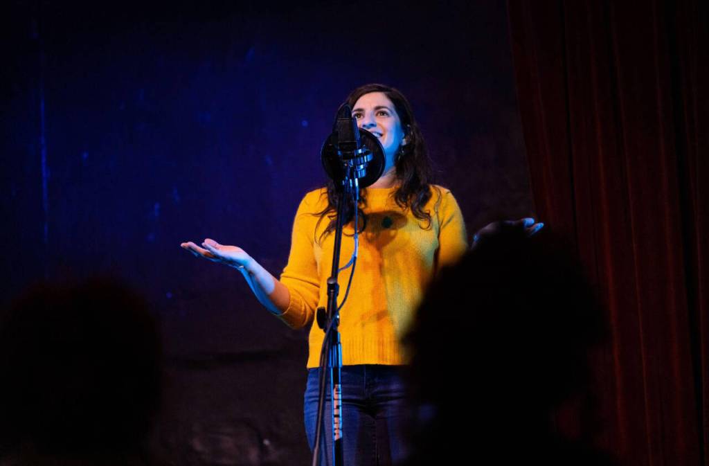 Photo by Elizar Mercado / Nessa Goldman, pictured here telling a story at The Jewelbox Theatre in Seattle, hosts the Out Loud Story Slam on April 14 in Port Angeles.